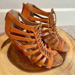 BCBG women’s laced leather wedge sandals Zippered back Women’s size 39 ( 8.5-9)